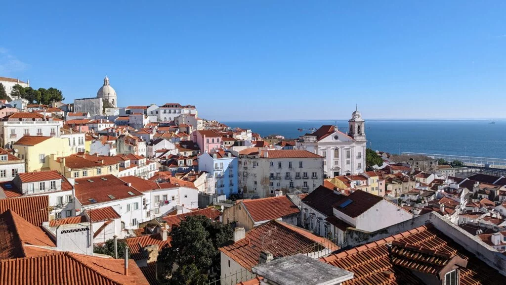 the rooftops of alfama from one of its miradouros in december