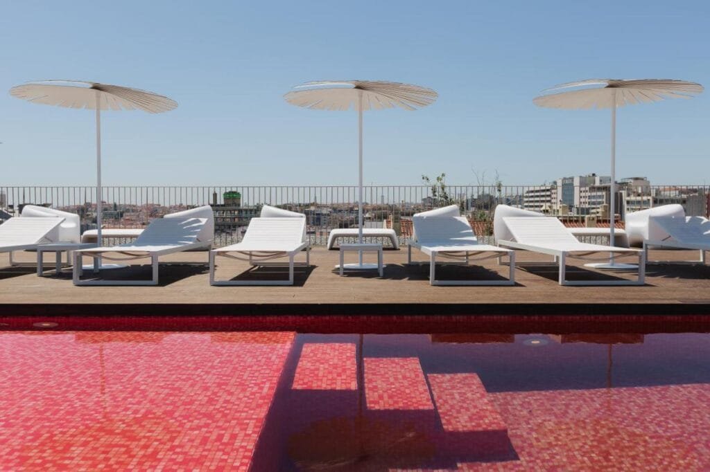 the rooftop pool area at Lumen light show hotel