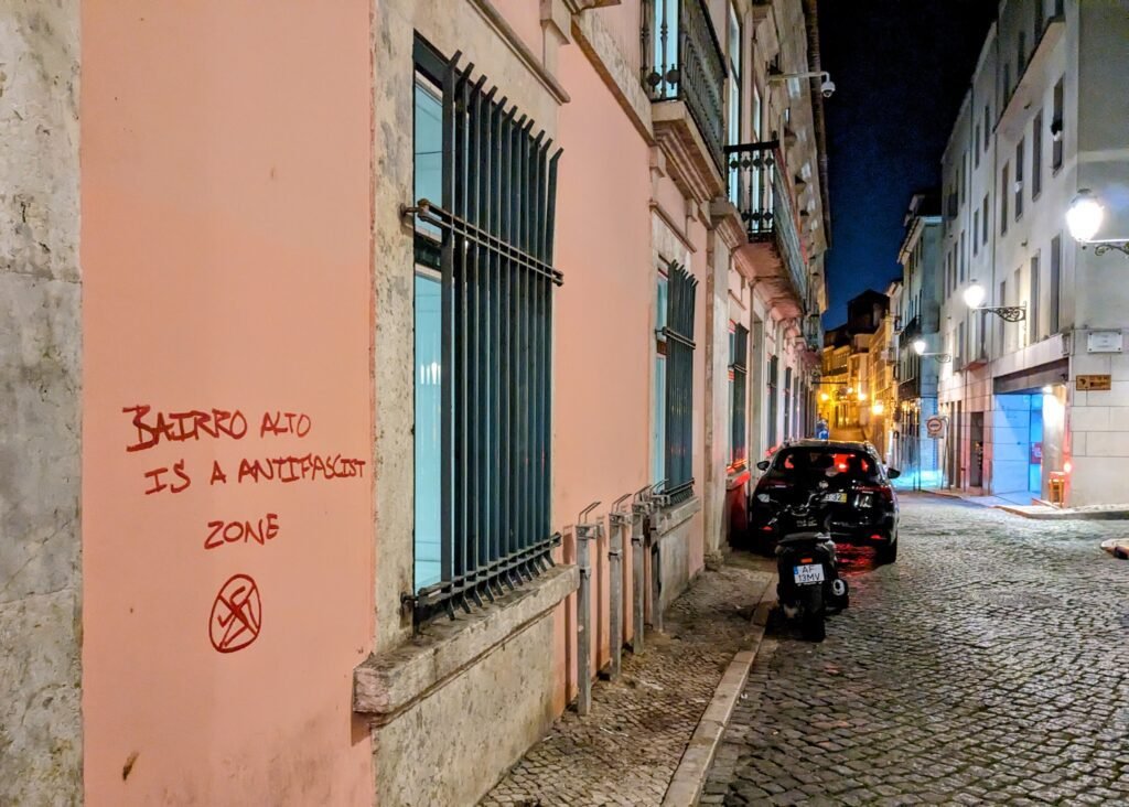 graffiti on a wall in bairro alto in lisbon