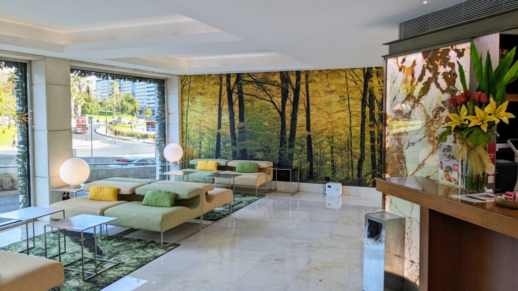 the lobby of hf fenix garden overlooking marquis de pombal square