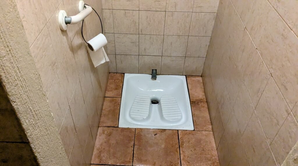 a squat toilet in osteria del sole in bologna italy