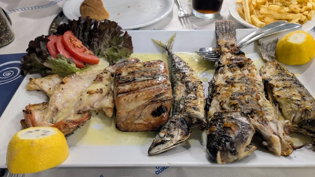 a fish platter served at fratzeskos fish tavern in perissa, santorini